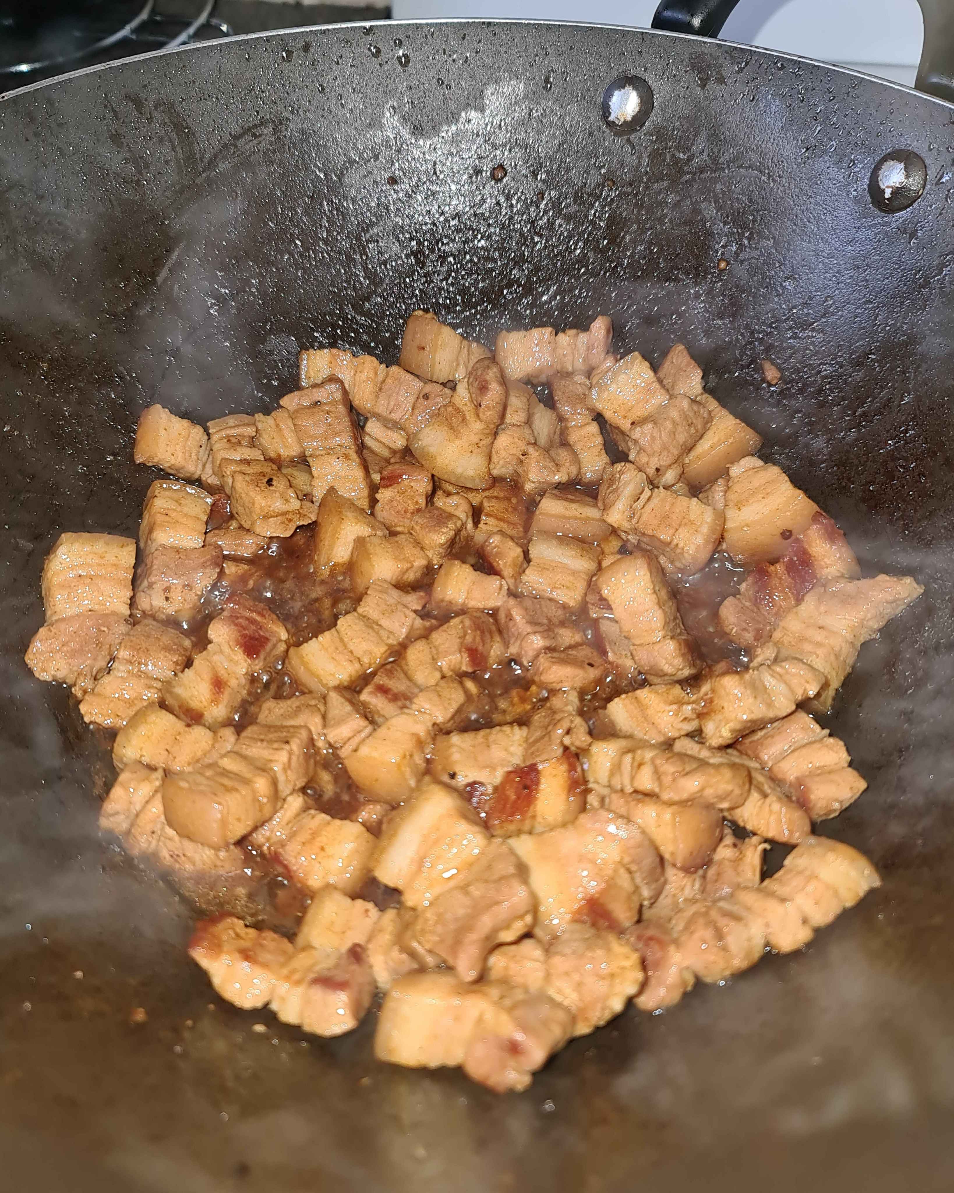 An example of caramelised pork cooked in a wok.